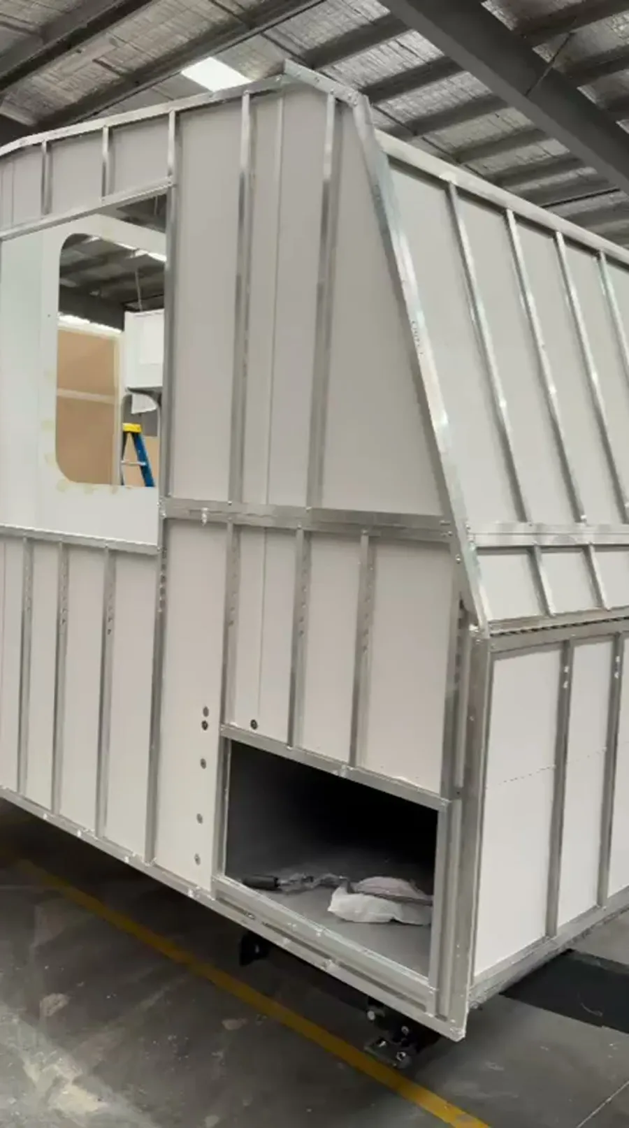 Composite wall panels going up on a Sahara caravan in the workshop