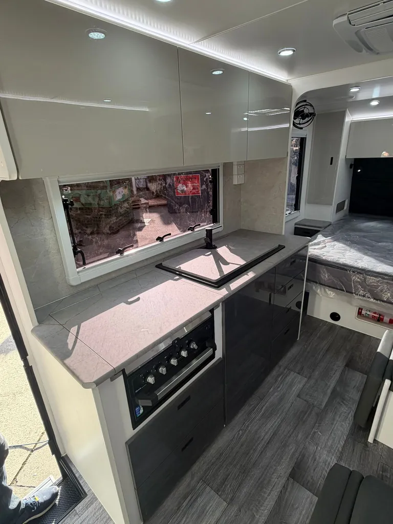 Kitchen and lounge inside a Sahara X-Master