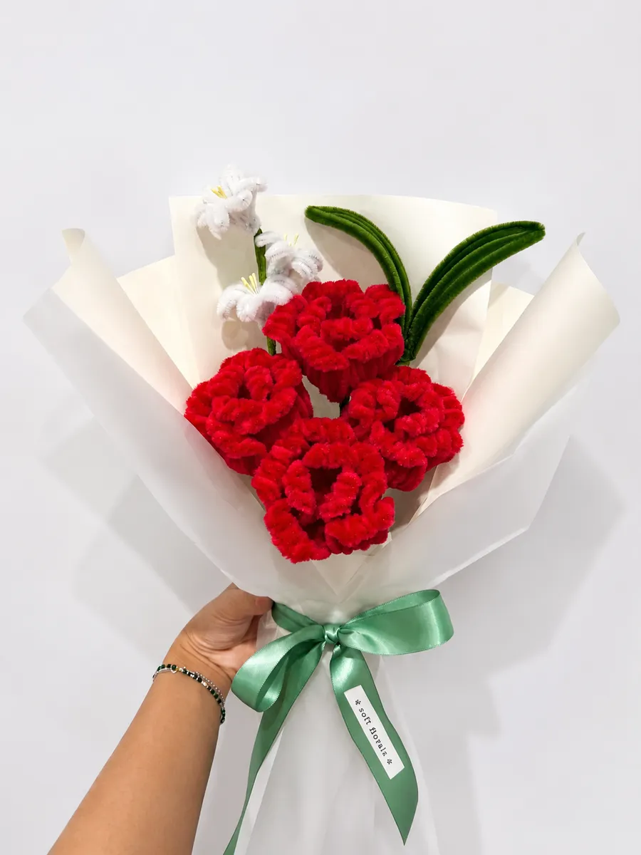 The Soft Roses bouquet held in hand